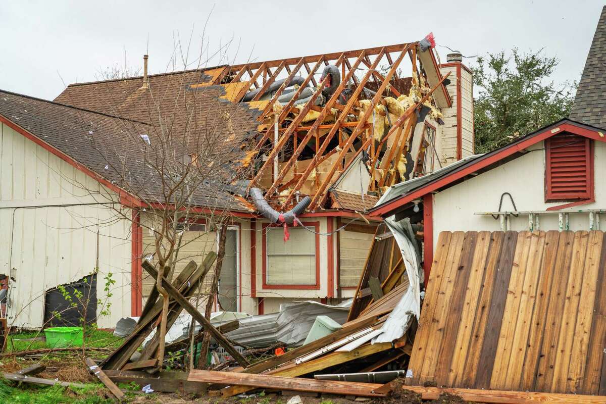 A home is damaged on Kent Drive where a tornado was reported to pass near Mickey Gilley Boulevard and Fairmont Parkway, Tuesday, Jan. 24, 2023, in Pasadena.