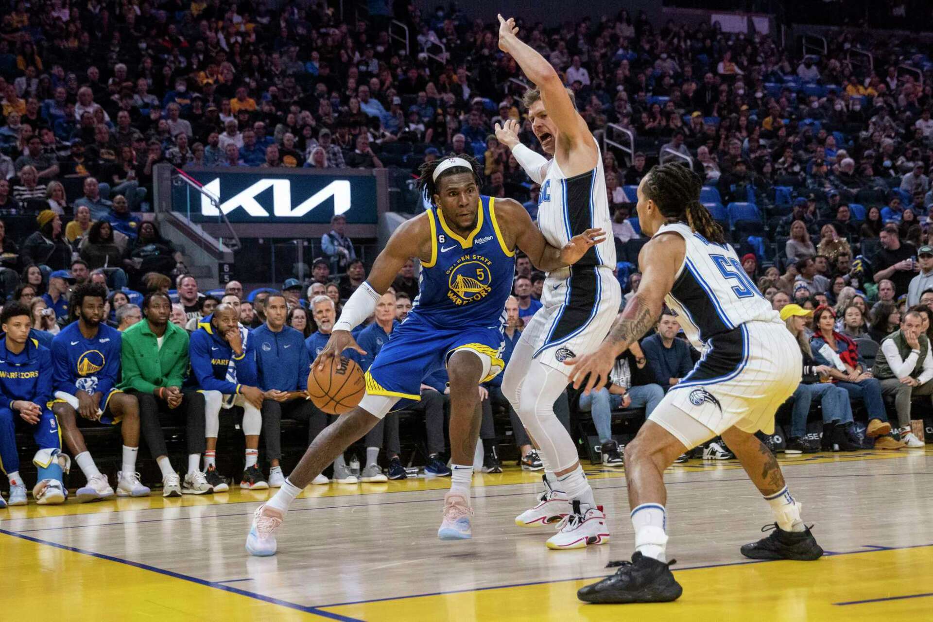 Warriors’ Kevon Looney honors Milwaukee coach who transformed his childhood