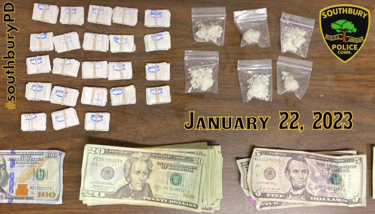 More than 200 bags containing narcotics were discovered inside a car during a traffic stop Sunday night, according to Southbury police.