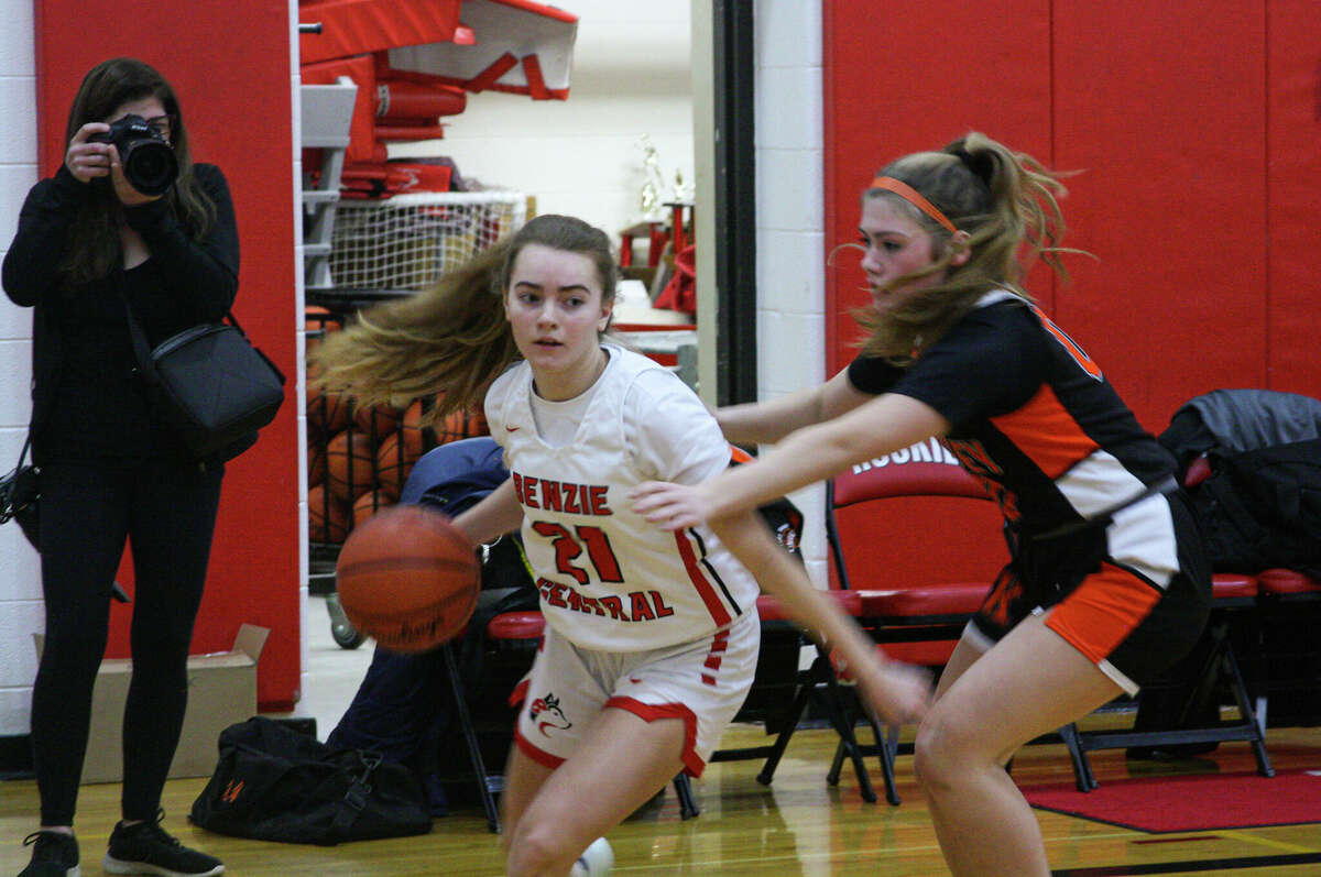 Benzie Central junior Kara Johnson cuts to the basket against Kingsley on Jan. 24, 2023 at Benzie Central Middle School. 
