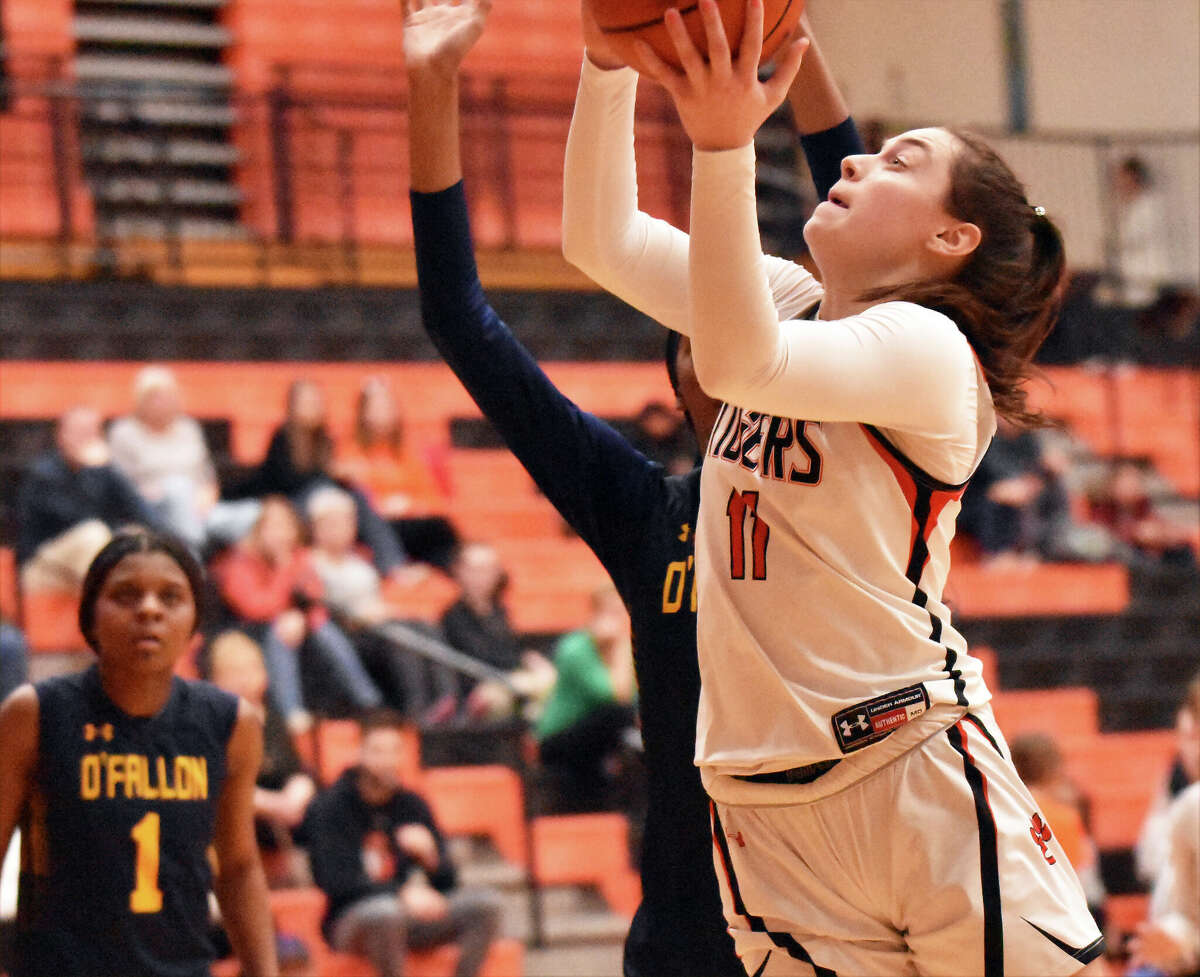 Edwardsville's Kaitlyn Morningstar puts up a contested shot against O'Fallon in the third quarter on Tuesday inside Lucco-Jackson Gymnasium in Edwardsville.