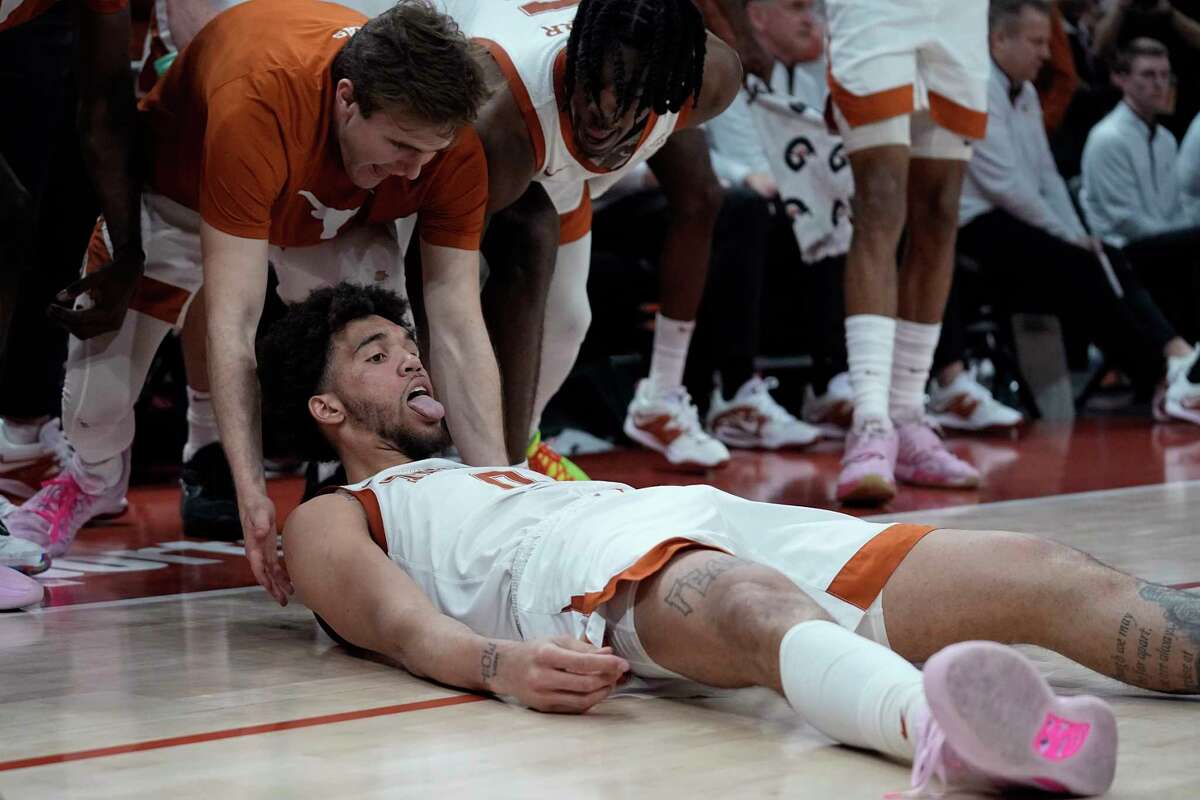 Texas forward Timmy Allen (0) reacts after he was fouled while shooting against Oklahoma State during the second half of an NCAA college basketball game in Austin, Texas, Tuesday, Jan. 24, 2023. (AP Photo/Eric Gay)