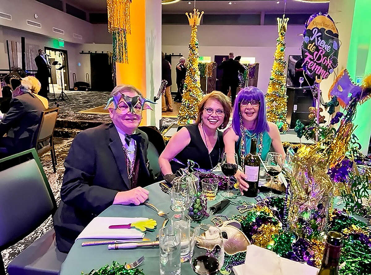 The Kingwood Women's Club hosted their first Mardi Gras fundraiser last year. Members got into the spirit of the event with lavish, fun costumes.