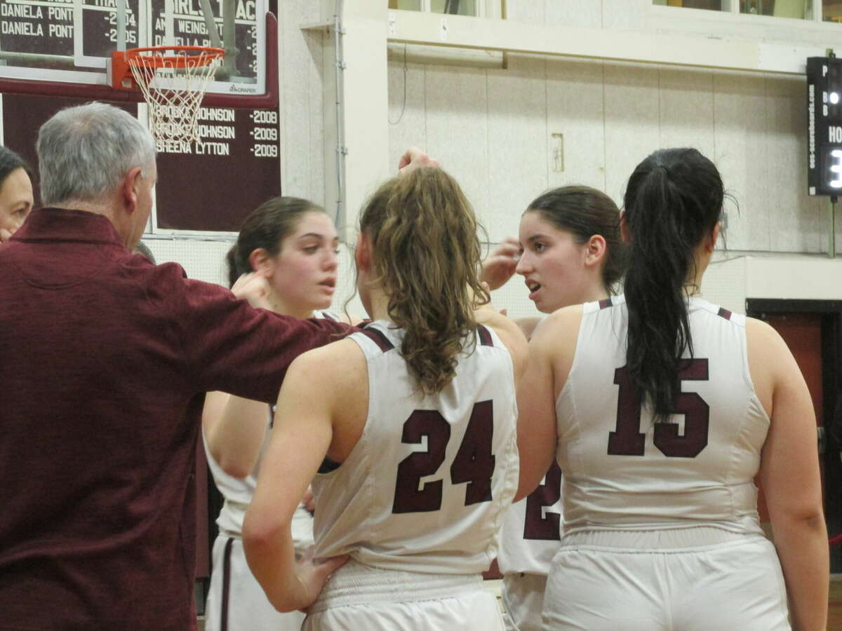 Torrington's switch from a man-to-man defense to a pressing zone built the Raider win over Wolcott into a defensive donneybrook after the first quarter at Torrington High School Tuesday night.