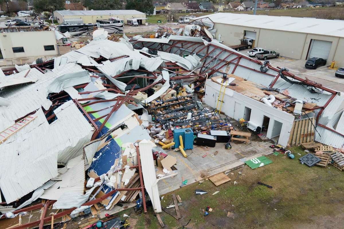 Damage to the IsoKinetic Speed Development building along Pansy Street is seen from Tuesday’s tornado that touchdown down, Wednesday, Jan. 25, 2023, in Pasadena.