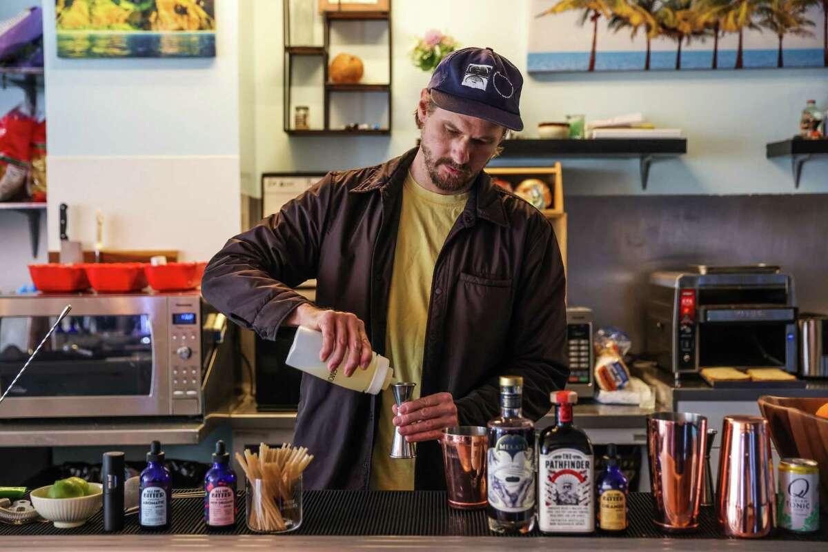 Danny Meeks prepares a nonalcoholic cocktail at Ocean Beach Cafe, a booze-free bar and bottle shop in San Francisco.
