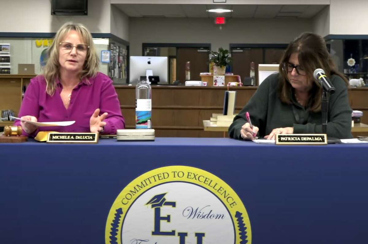East Haven Board of Education Chair Michele DeLucia, left, speaks during Tuesday night's meeting at East Haven High School.