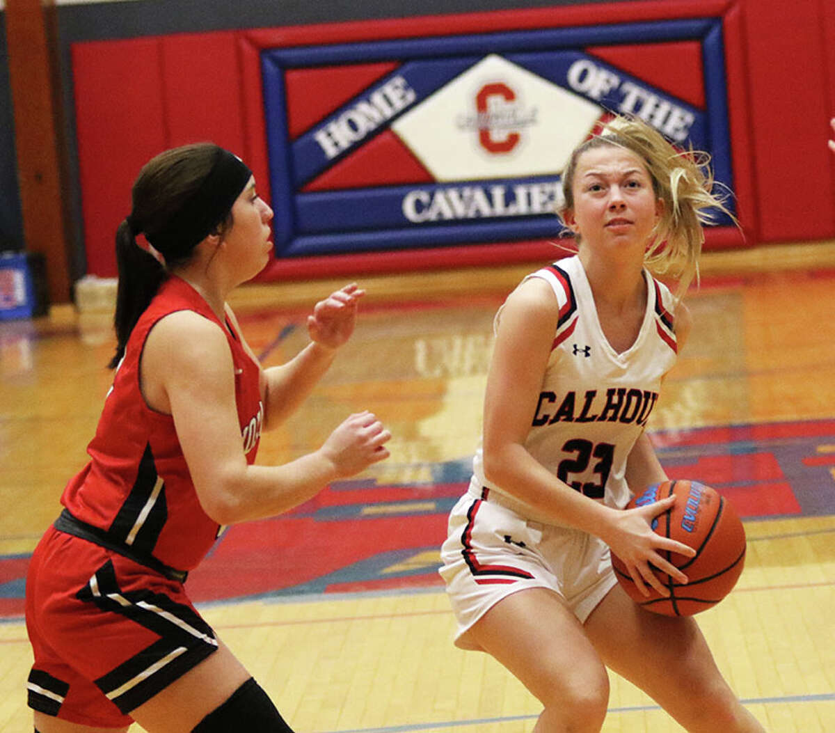 Calhoun's Jaelyn Hill (right) looks to the basket against a Nokomis defender in a game at December's Carlinville Tourney. On Tuesday, Hill had 17 points, but the Warriors lost to Gateway Legacy in a quarterfinal at the Carrollton Tourney.