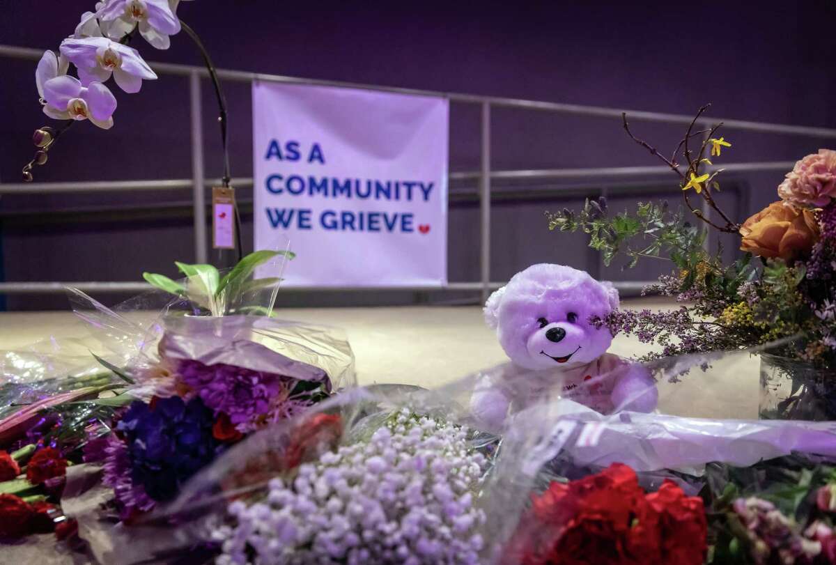 A teddy bear and flowers left at a memorial for victims of the mass shooting in Half Moon Bay, Calif., on Tuesday, January 24, 2023. Several memorials have been left in town and also at the sites where 7 were killed.