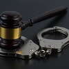 Gavel and handcuffs in feature photo