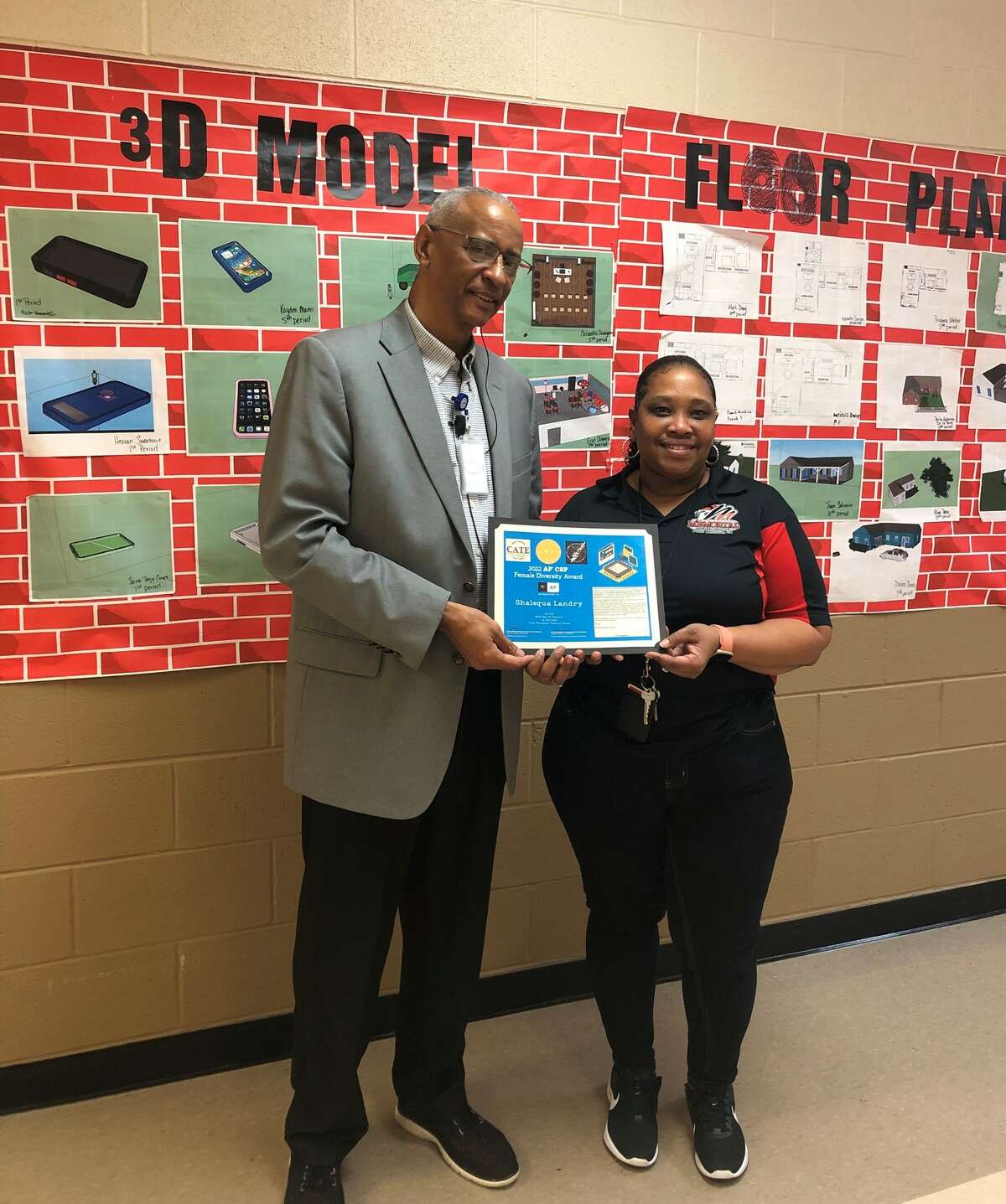 Port Arthur ISD Memorial High School Career and Technical Education computer science instructor Shalequa Landry, right, is recognized with the College Board Advanced Placement Computer Science Female Diversity Award, Jan. 20, 2023.
