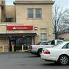 The Santander Bank branch at the intersection of Grand Avenue and Ferry Street in New Haven. The Boston-based bank has announced it is closing branches in Hartford and Manchester, two of its 17 locations in the state.