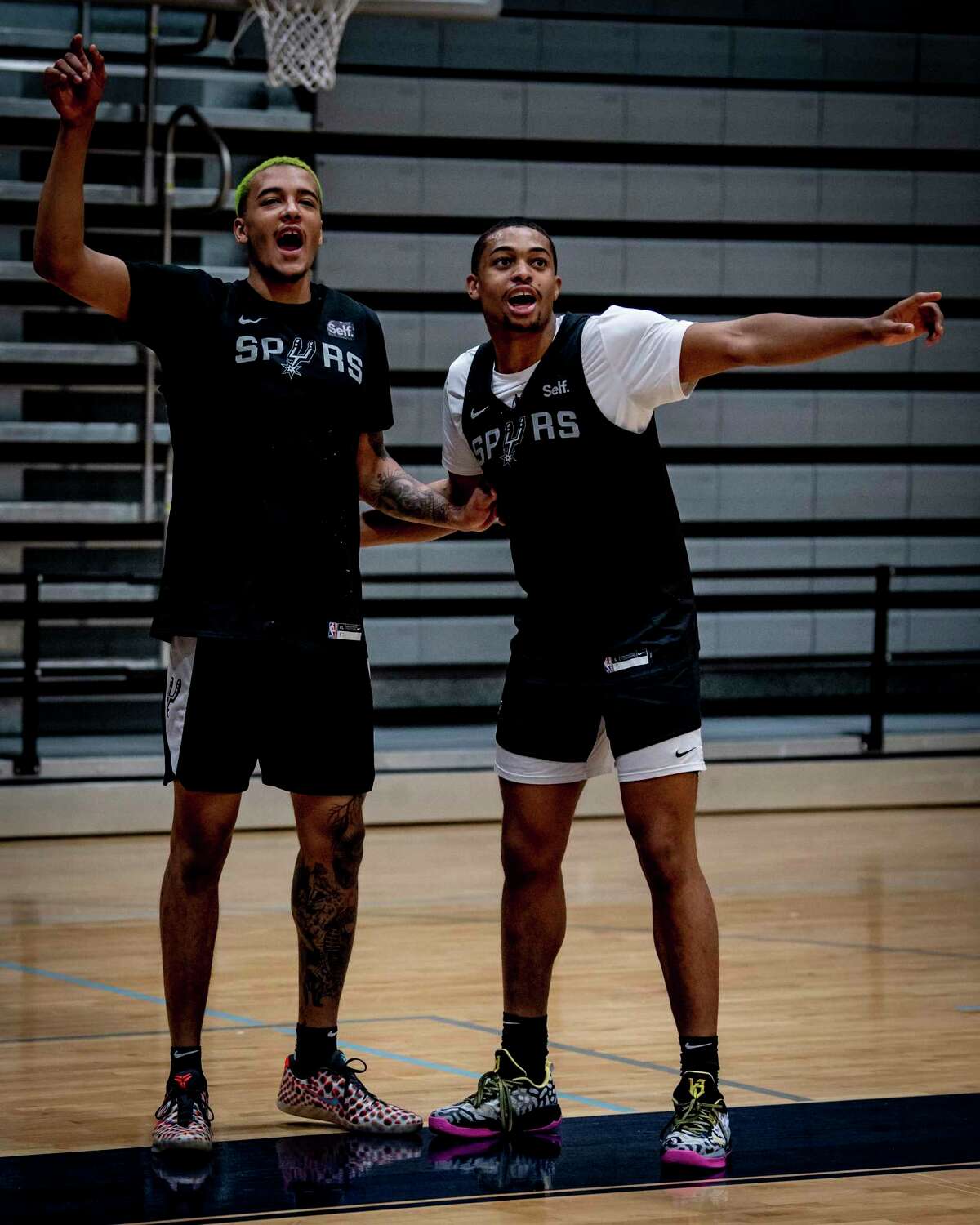 January 2, 2023, New York, NY: San Antonio Spurs forward Jeremy Sochan and San Antonio Spurs guard Keldon Johnson talk as they look to celebrate a drill win during shoot around before the game against the Brooklyn Nets at Baruch College in New York, New YorkMonday, January 2, 2023. (Photo by Reginald Thomas II/San Antonio Spurs)