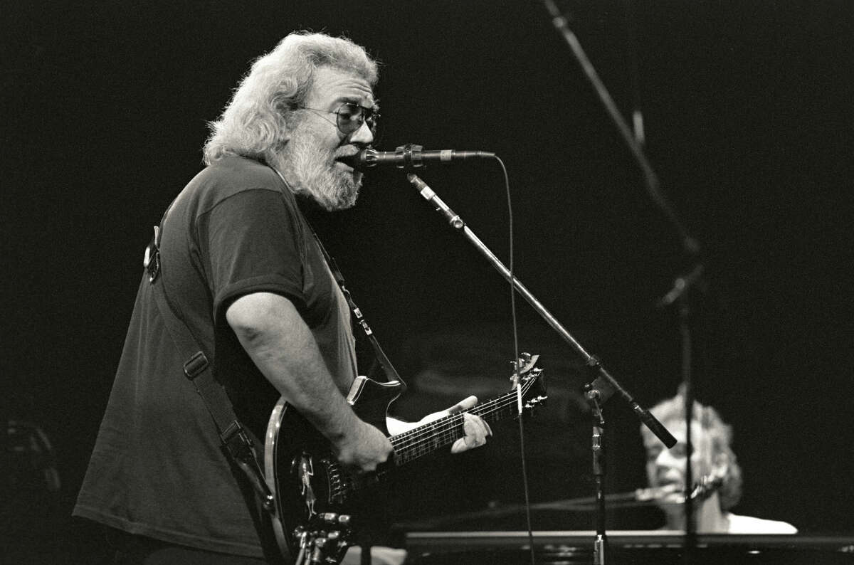 Singer-songwriter Jerry Garcia, left, of the Grateful Dead and Bruce Hornsby perform at McNichols Sports Arena on Dec. 13, 1990, in Denver, Colo. The image was tinted by the photographer. 