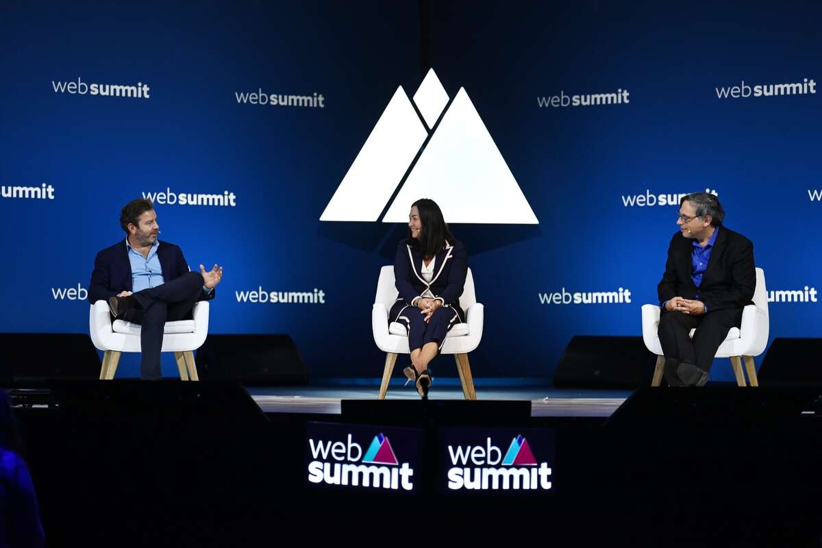PagerDuty CEO Jennifer Tejada, center, sits on the SaaS Monster Stage during day two of Web Summit 2021 at the Altice Arena in Lisbon, Portugal.