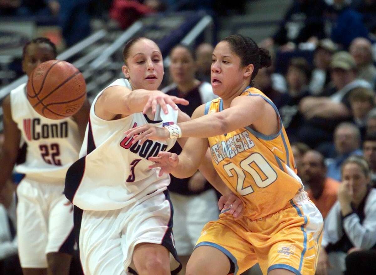 UConn's Diana Taurasi tries to block the pass from Tennessee's Kara Lawson on Jan. 4, 2003.  