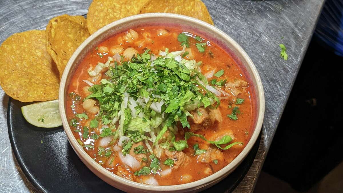 Calavera Mexican Kitchen opened in downtown Houston's Bravery Chef Hall in June 2022, sevring pozole (pictured), tacos and more.