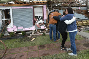 Photos: Some 100 homes damaged by Orange County tornado