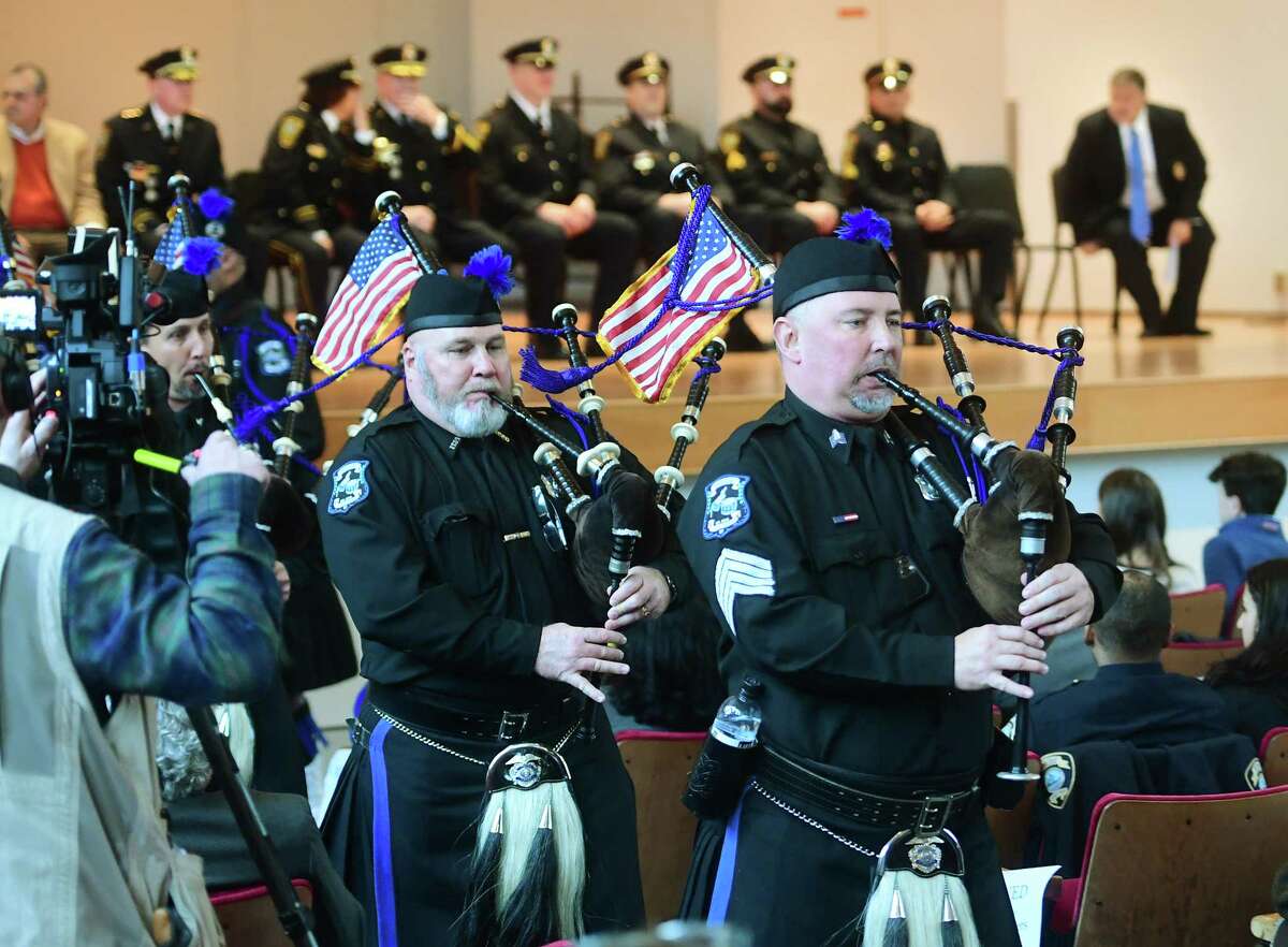 The Fairfield County Police Pipes and Drums perform at the Swearing In and Promotion Ceremony at City Hall in Norwalk, Conn. on Wednesday, January 25, 2023.