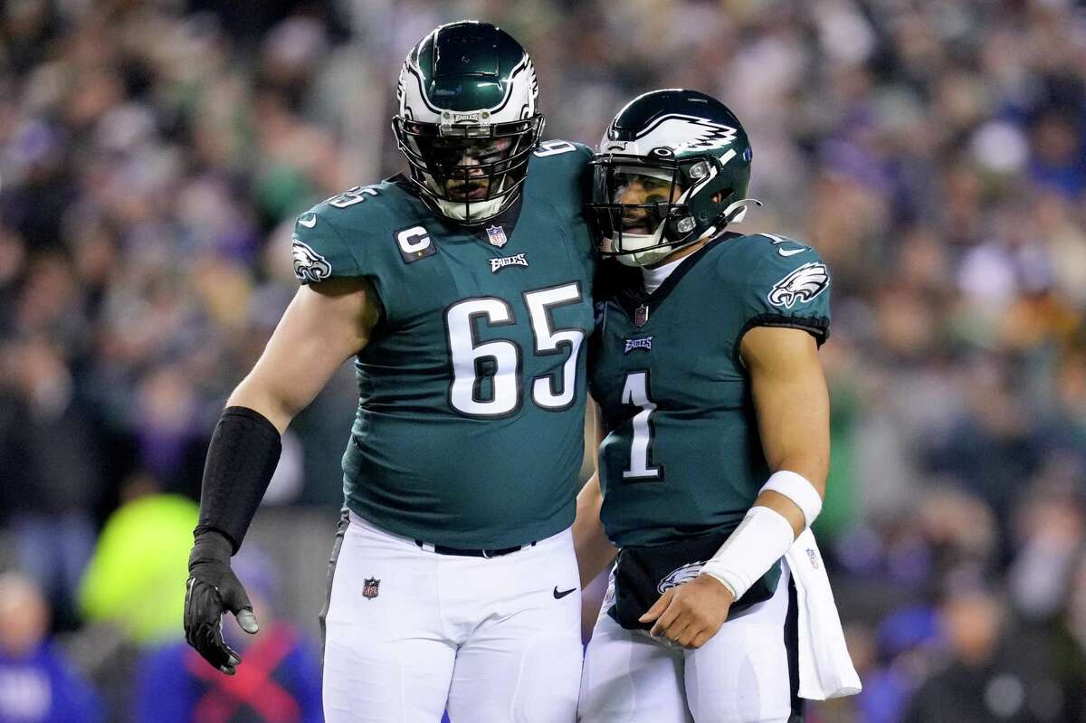 Eagles right tackle Lane Johnson (65) has been a wall in front of quarterback Jalen Hurts, not allowing a sack in his past 29 games dating to 2020.