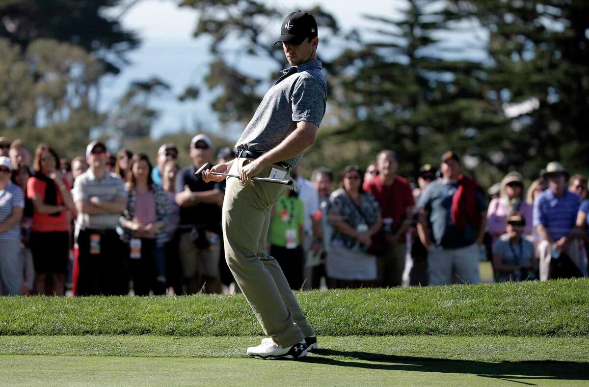 Giants catcher Buster Posey tries to bend a putt in on No. 2 during the final round of the 2015 AT&T Pebble Beach National Pro-Am. Posey will return to Pebble for next week’s Pro-Am.