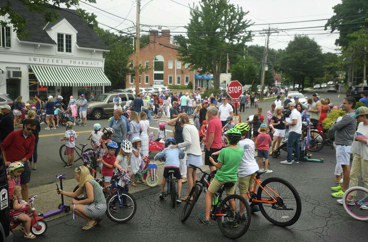 Hundreds gather for the start of the annual Fourth of July bicycle parade on Pequot Avenue in Southport in 2021.