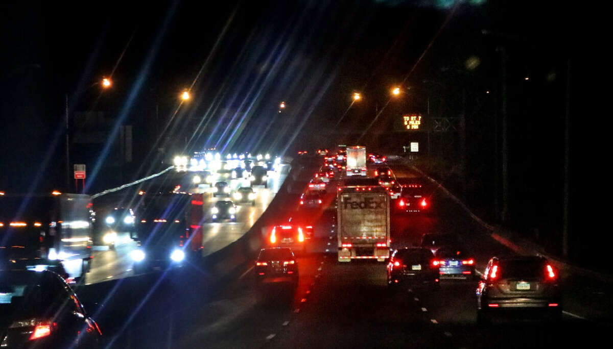 A view of traffic along Interstate 95 moving southbound, at left, and northbound through Stamford, Conn., on Friday January 13, 2023. The stretch of I-95 South from Westport to Greenwich ranked as the most congested corridor in the United States. The same section northbound ranked as No. 3.