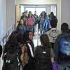 Students fill the hallway of the new addition at Danbury High School between classes on Wednesday, October 10, 2018, in Danbury, Conn. Enrollment at the high school is at about 3,390, which is just over the building capacity of around 3,370, according to figures presented to the school board earlier this month.  