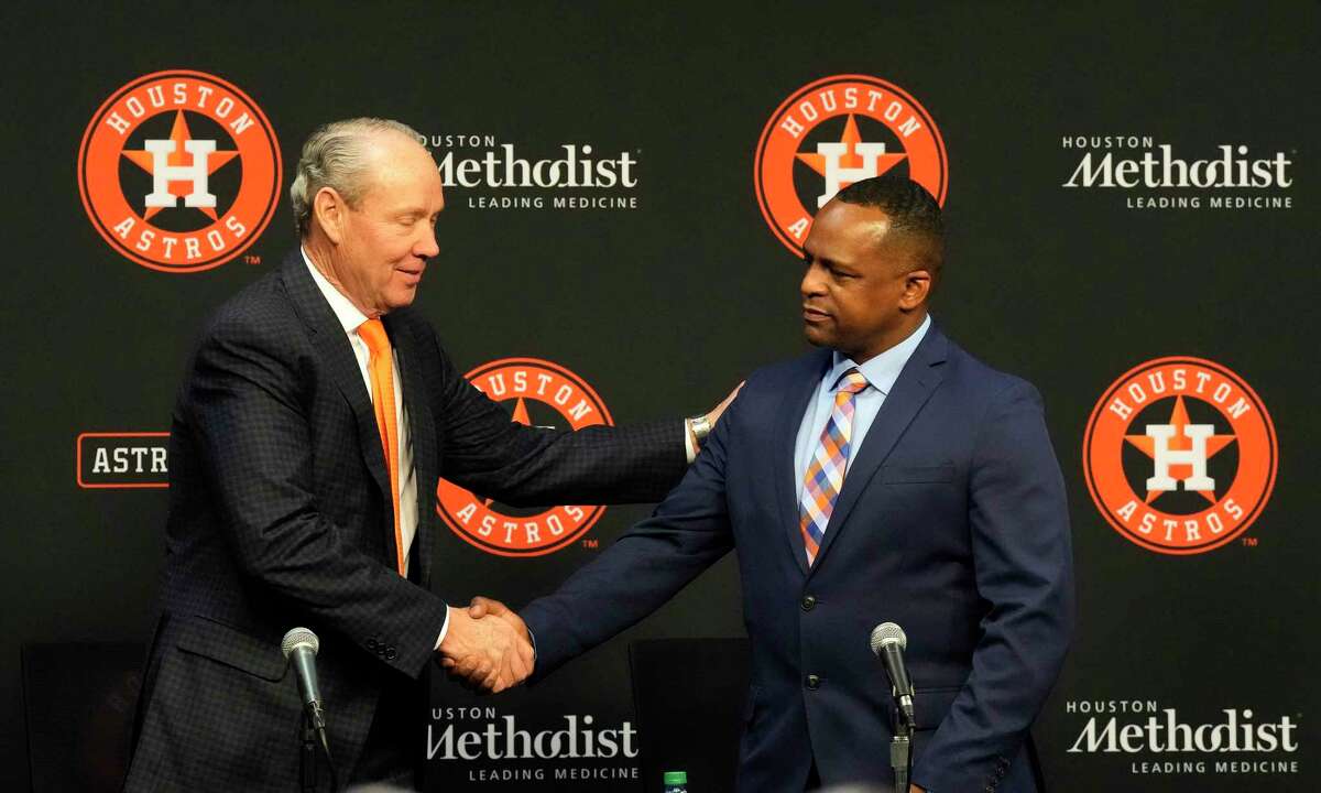 During the news conference at which he introduced his new general manager, Astros owner Jim Crane, left, noted that Dana Brown is “seasoned at player acquisition, development and retention.” 