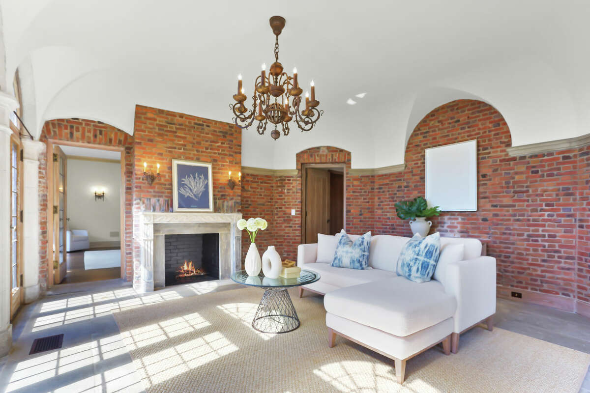 A Gatsby-Esque-style mansion by the water at 1143 Sasco Hill Road in Southport is on the market for $14,000,000.