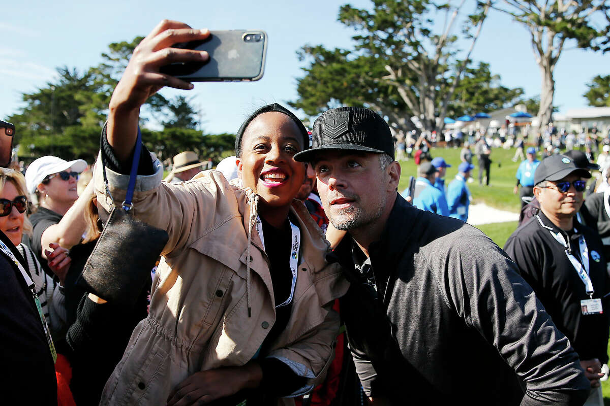 Actor Josh Duhamel takes a selfie with a fan during the 3M Celebrity Challenge prior to the 2020 AT&T Pebble Beach Pro-Am at Pebble Beach Golf Links in Pebble Beach, California.