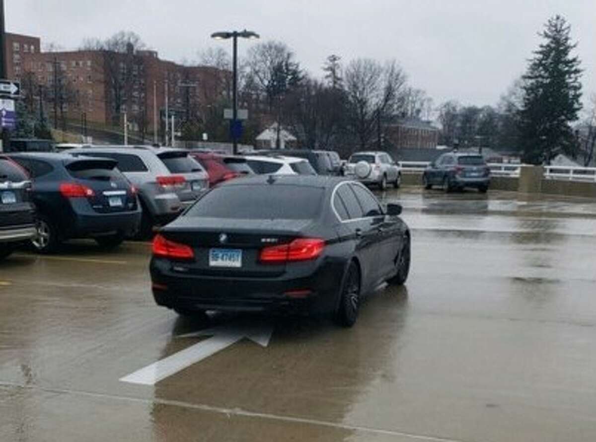 Norwalk police said this black BMW sedan was one of two vehicles involved in catalytic converter thefts Wednesday. The BMW was involved in a theft at Norwalk Hospital, while the second vehicle, a tan Lexus, was seen fleeing incidents in East Norwalk.