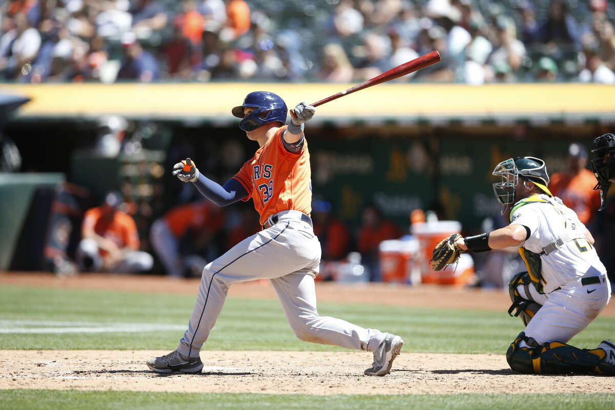 Korey Lee #38 of the Houston Astros bats during the game against the Oakland Athletics at RingCentral Coliseum on July 10, 2022 in Oakland, California.