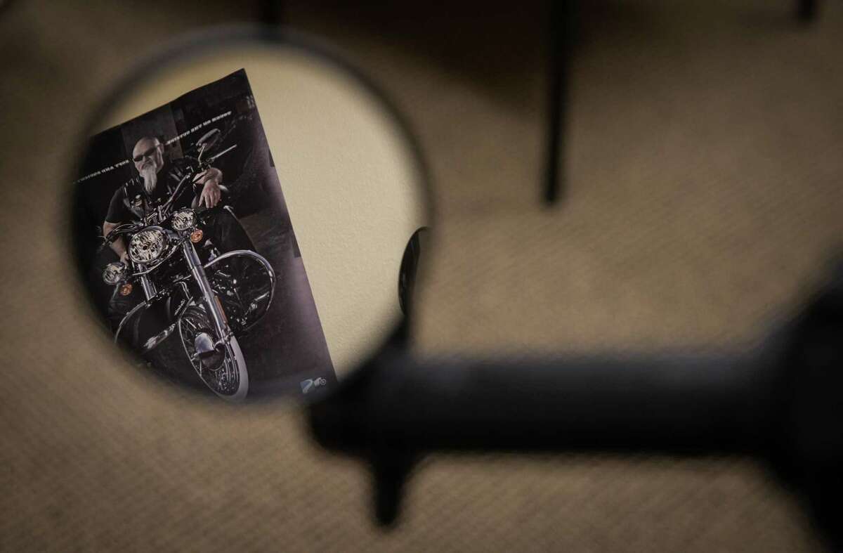 A motorcycle safety poster hangs on the wall Wednesday, Jan. 18, 2023, at San Jacinto Harley-Davidson in Pasadena.