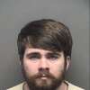 Lane Walker was charged with improper relationship with a student, stemming from accusations made while he was a teacher at Southwest High School.