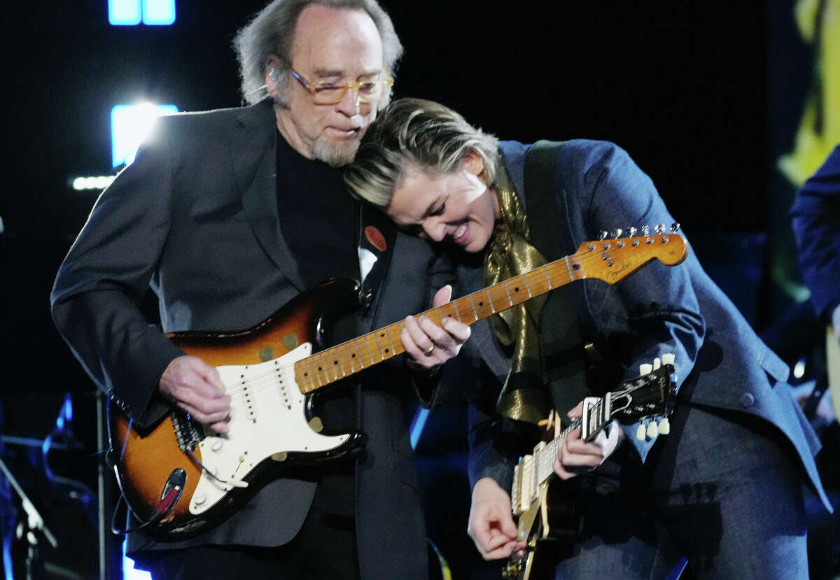 Stephen Stills (left) and Brandi Carlile perform onstage in April in Las Vegas during the MusiCares Person of the Year program honoring Joni Mitchell. Barry Cloyd, T.J. Jones and Tom Abbot will perform a tribute to Stills on Sunday in Bishop Hill.
