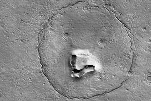 Nasa Mars satellite finds cute bear face on planet surface