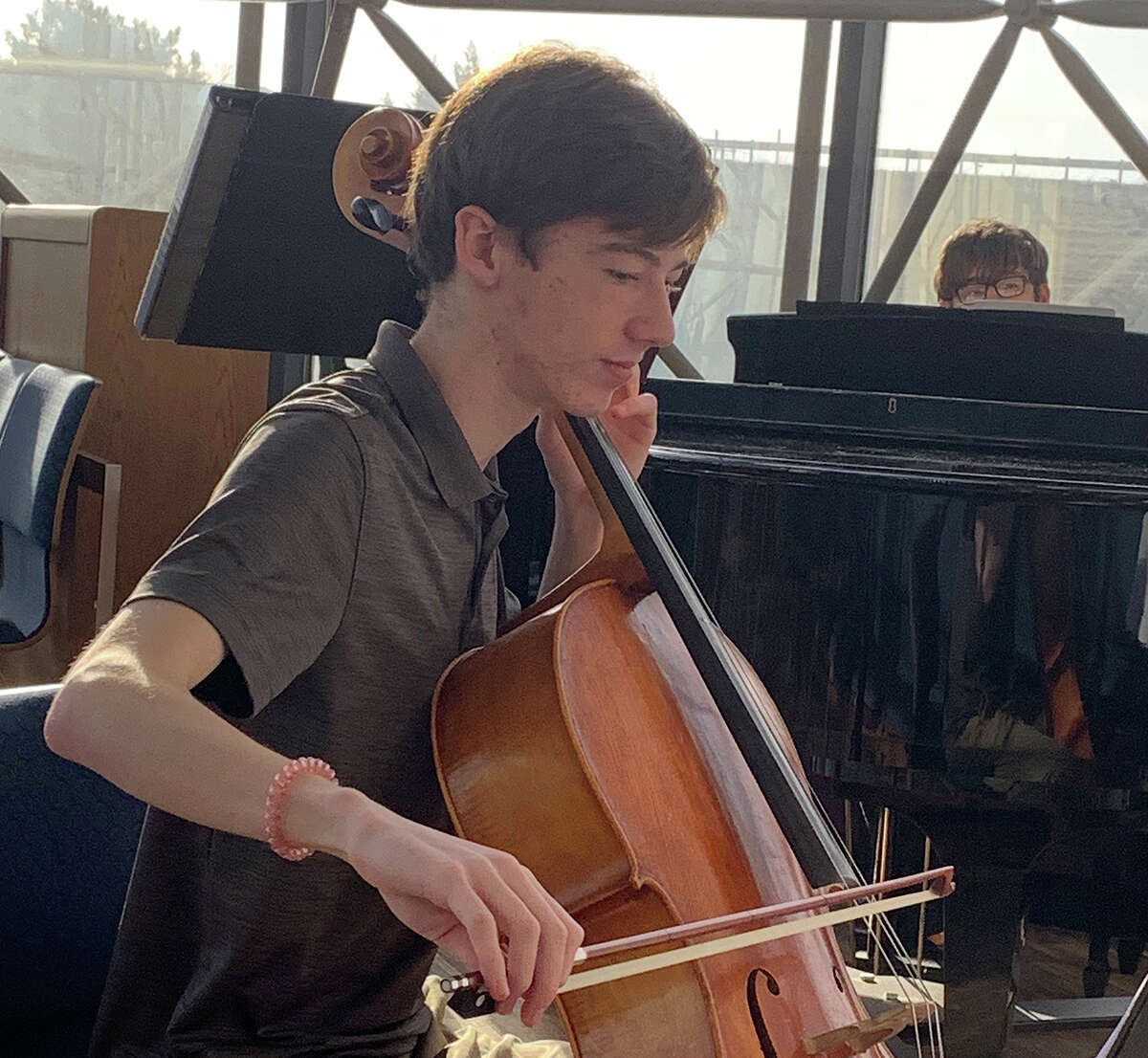 A cellist with Metro-East Lutheran High School performs during a choir and strings ensemble Tuesday at the Lutheran Church Missouri Synod's International Center in St. Louis.