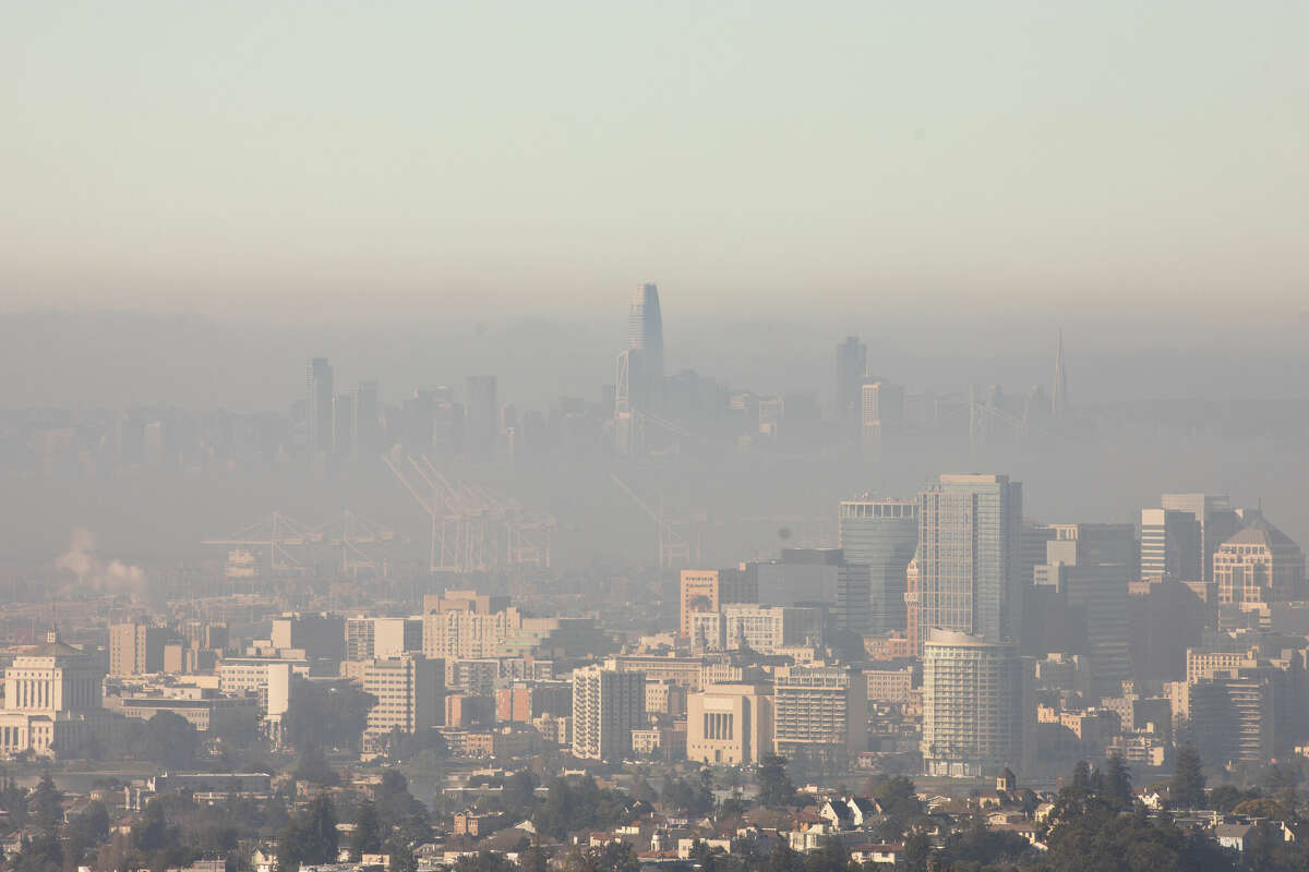 A low layer of fog covers the San Francisco Bay while downtown San Francisco is clear, as viewed from Oakland, Calif., on Jan.27, 2023.