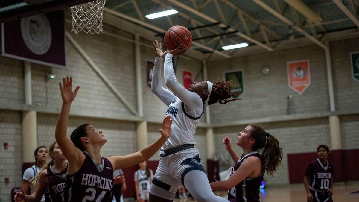 De'Naya Rippey of Cheshire Academy puts up a shot.