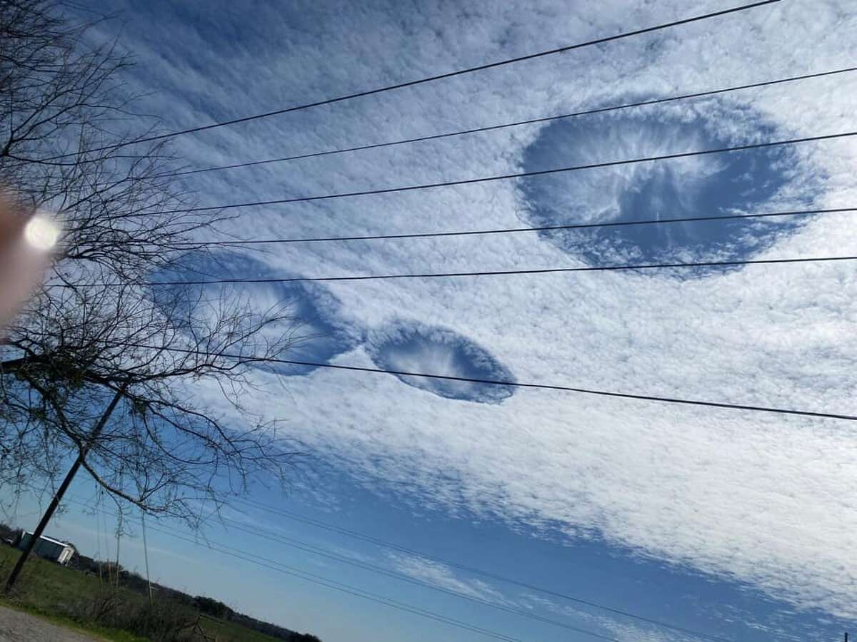 Rare fall streak clouds, which are also known as hole punch clouds, were captured above Central Texas on Thursday