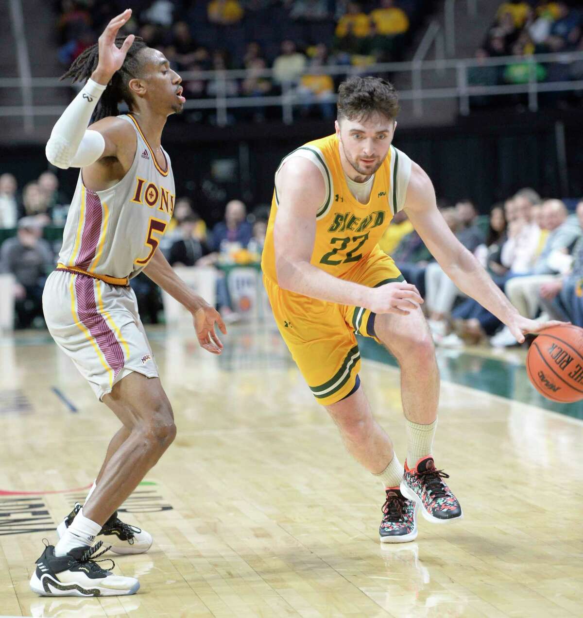 Siena basketball's Andrew Platek, right, said the Saints will continue to play for John Baer and Evan Franz, who died a day apart last week.