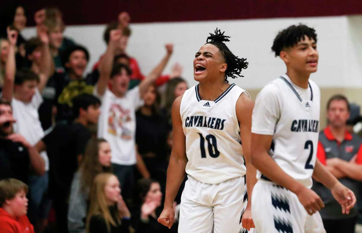 College Park guard Drake Kelley (10) celebrates after defeating The Woodlands 64-49 during a District 13-6A hight school basketball game at College Park High School, Friday, Jan. 27, 2023, in The Woodlands.