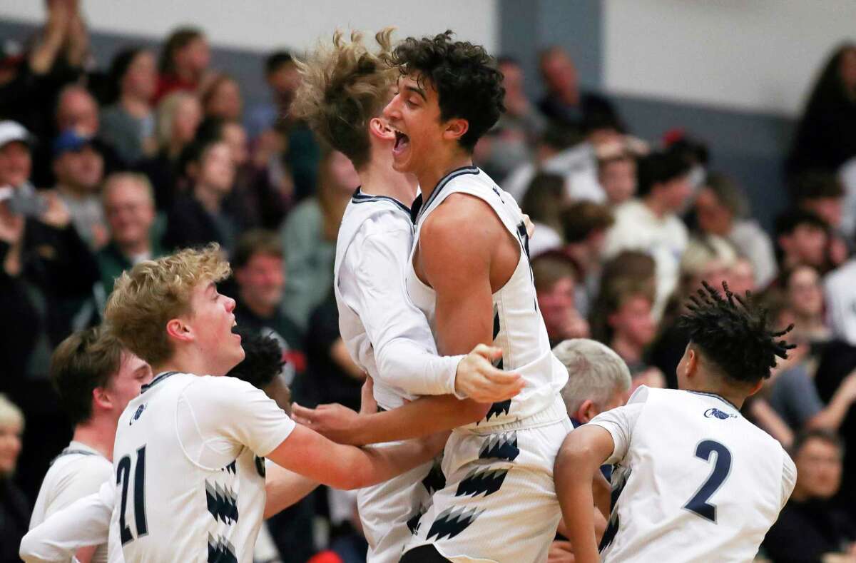 College Park celebrates after defeating The Woodlands 64-49 during a District 13-6A hight school basketball game at College Park High School, Friday, Jan. 27, 2023, in The Woodlands.