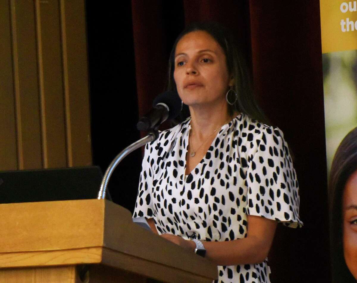 Erica Bañuelos, associate commissioner for Child Protective Services, says the state couldn’t commit to having no children without placement by June, but “I can commit that we will continue to put the same level of effort towards reducing those numbers.” She’s shown speaking at a 2018 event.