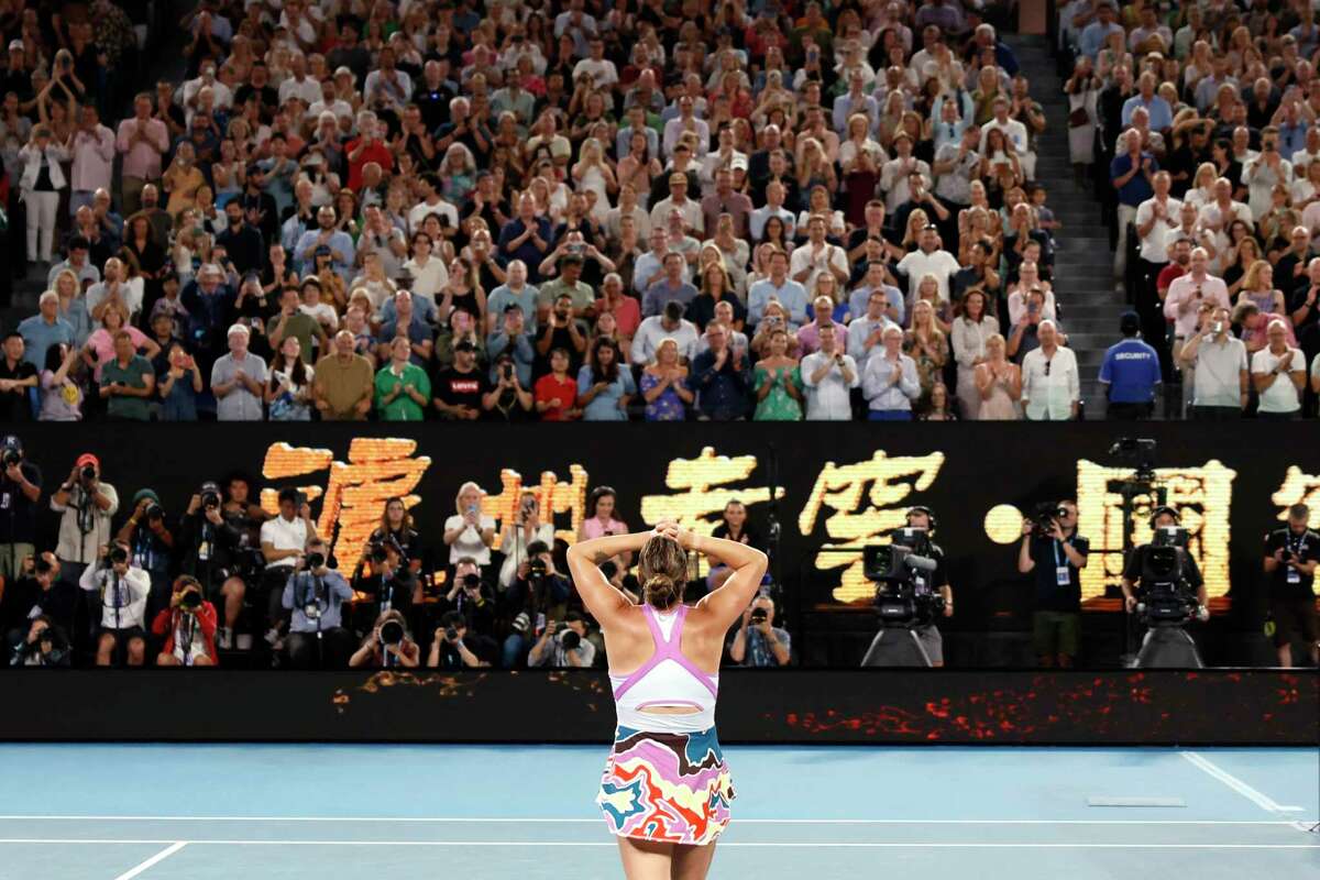Aryna Sabalenka of Belarus reacts after defeating Elena Rybakina of Kazakhstan in the women's singles final at the Australian Open tennis championship in Melbourne, Australia, Saturday, Jan. 28, 2023.