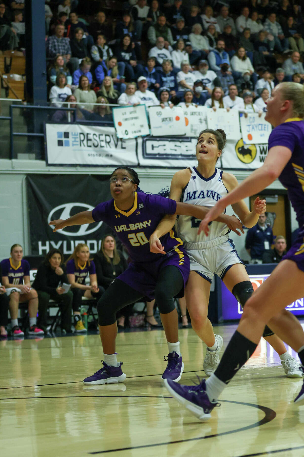 UAlbany junior guard Kayla Cooper (20) boxes out Maine's Abbe Laurence in an America East game on Saturday, Jan. 28, 2023. Cooper paced the Great Danes with 23 points.