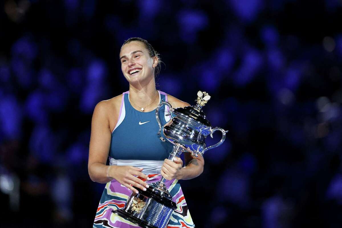 Belarus’ Aryna Sabalenka poses with the trophy after beating Kazakhstan’s Elena Rybakina in the women’s final at the Australian Open on Saturday Melbourne.