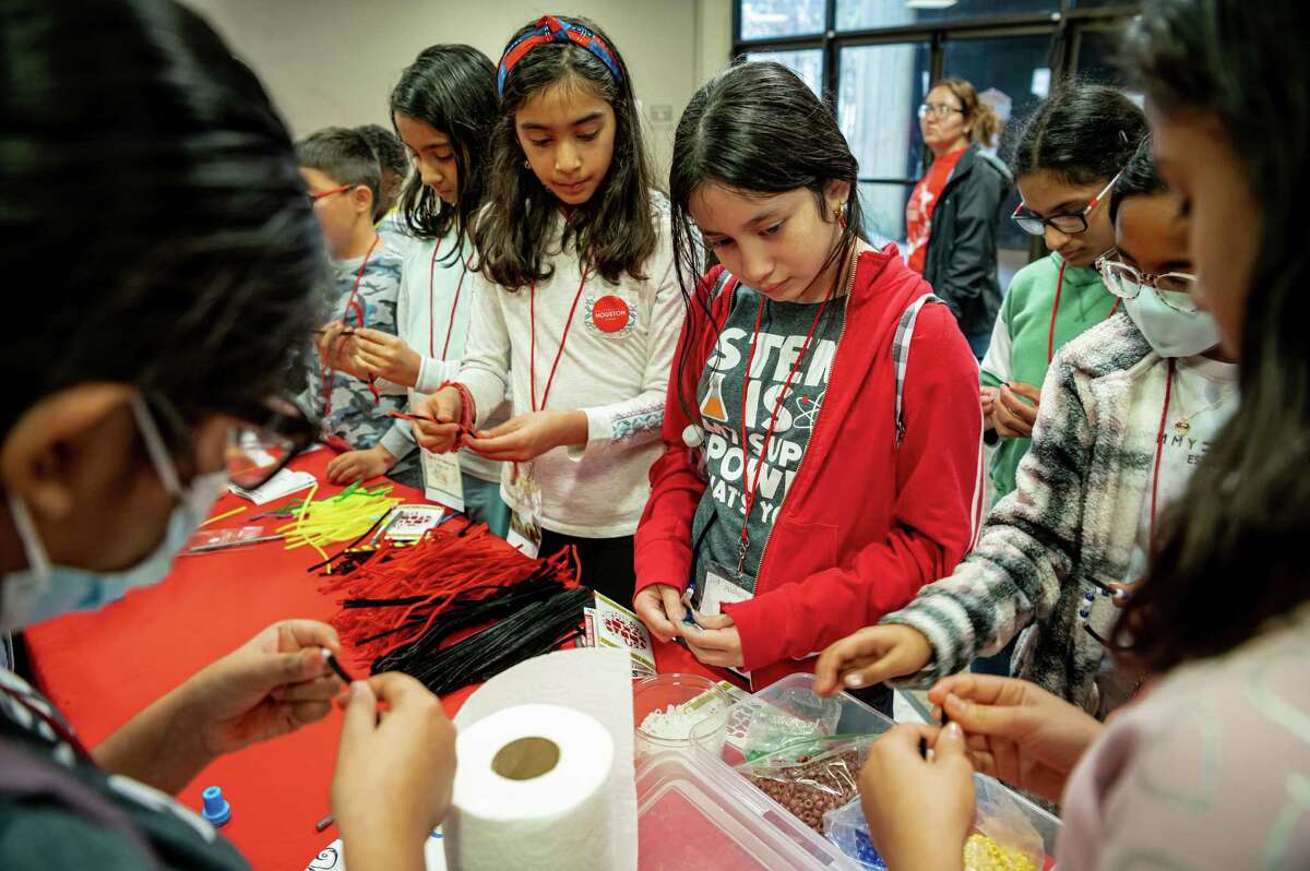 Students interact with the “Energy Beads” learning station during STEM Zone Saturday, on January 28, 2023 in Houston, Texas. It is a monthly outreach program hosted by The University of Houston that provides engagement in the sciences and engineering fields. Participants engage in inquiry-based STEM education and activities. They discover new areas of interest, identify real-world problems and explore innovative solutions and ideas. This month’s topic focused on Energy in Industry.