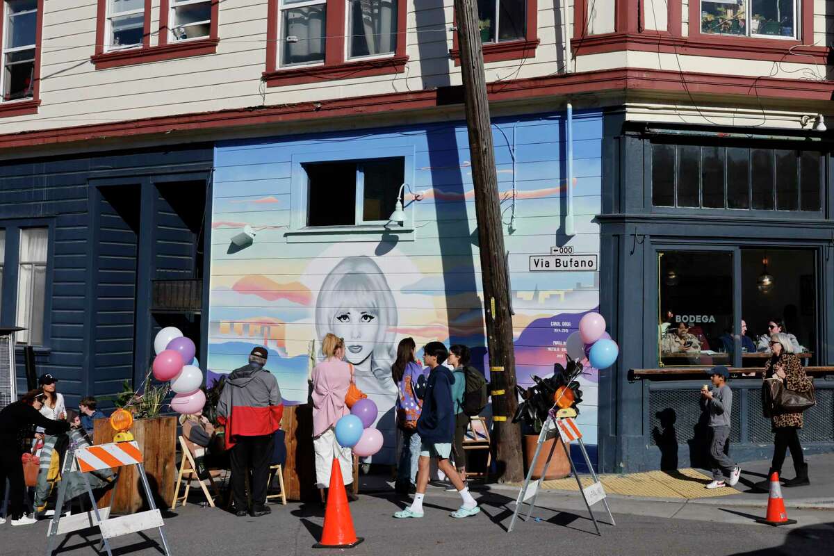 Carol Doda, a pioneer of topless entertainment who headlined the Condor Club, is immortalized in a mural celebrated Saturday outside the Bodega restaurant in San Francisco’s North Beach.
